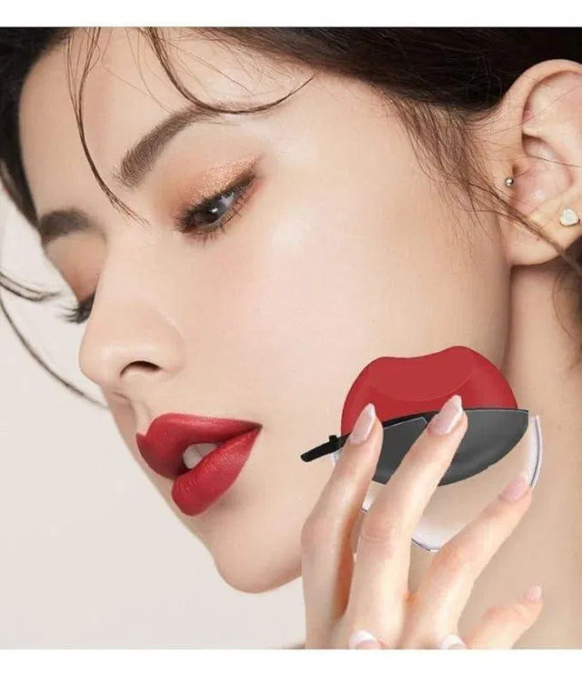 Red matte waterproof lipstick on applicator, shown being applied